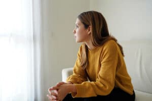 Woman thinking about the signs of cocaine withdrawal