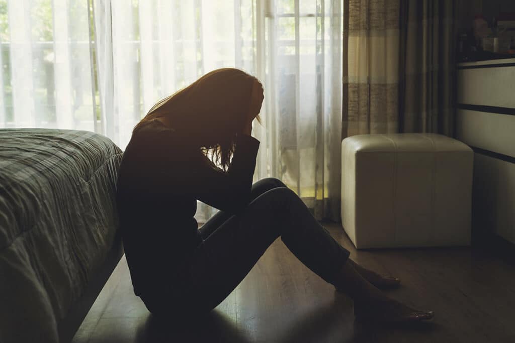 Woman experiencing the long-term effects of trauma